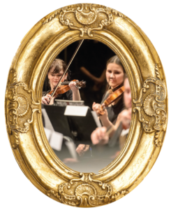 Orchestra performers playing in gold frame